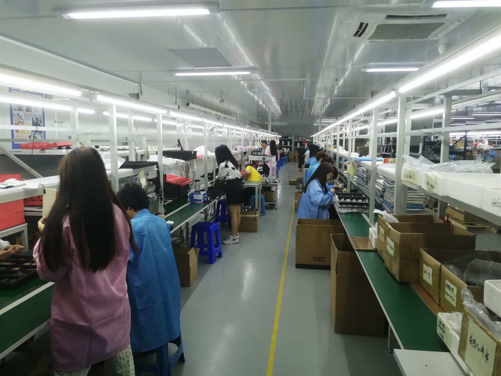 EngraSun factory — packing workshop with cartons