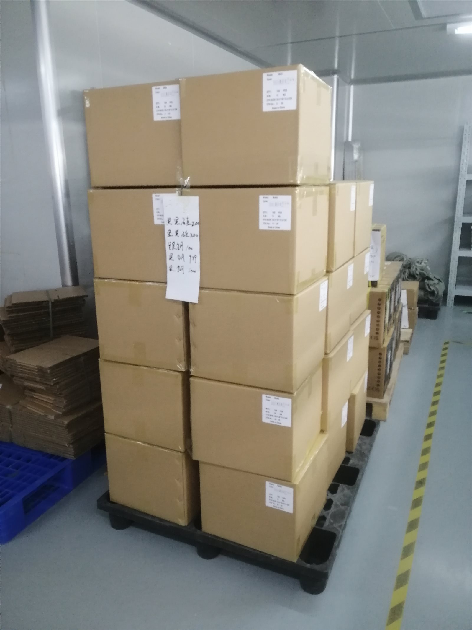 EngraSun factory — pallet of export cartons in the warehouse